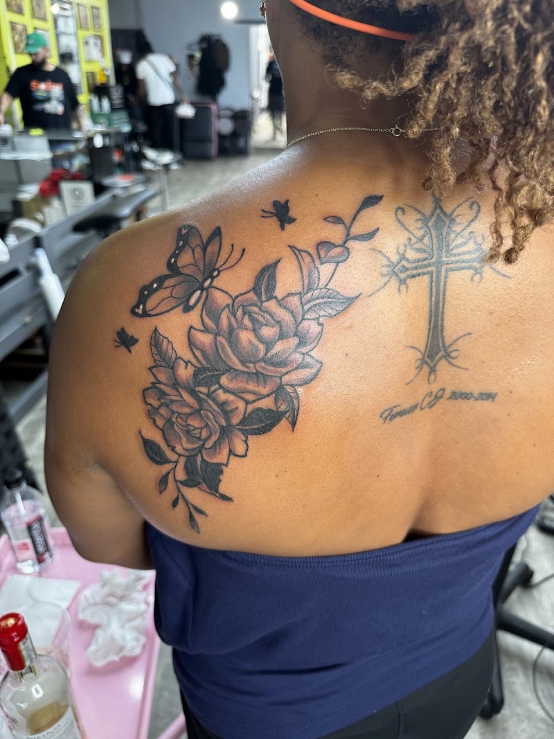 Iron Palm Tattoos & Body Piercing